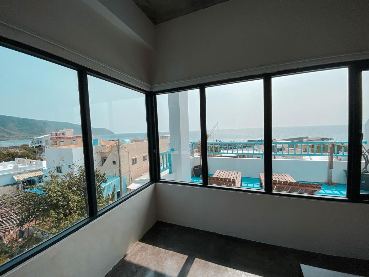 Lugo Hotel Manzhou Buitenkant foto